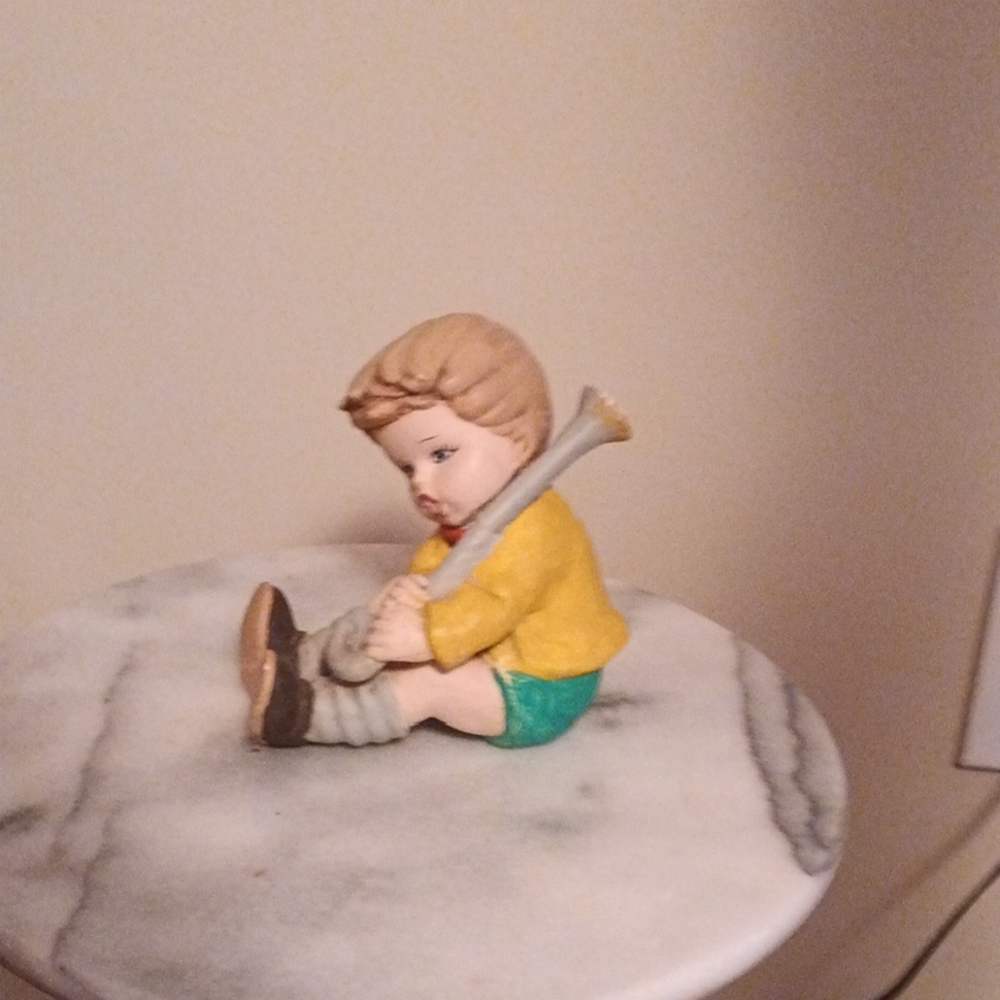Charming Boy Figurine in Yellow and Green
